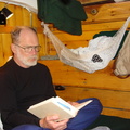 DSC03108 Dick reads in the library of cabin 7